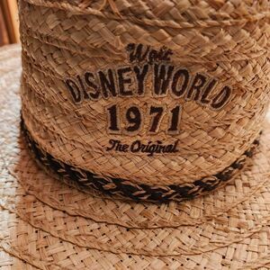 Vintage 1971 Disney World straw hat with black braid trim hats. Disney Parks